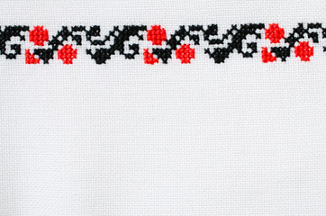 Texture of White Canvas with Slavic Embroidery.