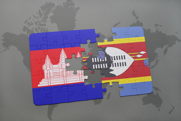 puzzle with the national flag of cambodia and swaziland on a world map