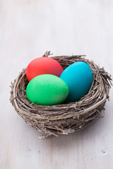 Easter eggs in the nest. Spring discount card.