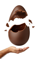 Uovo di Pasqua esploso sul palmo di una mano 