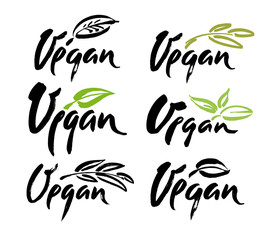 Vegan hand written calligraphy lettering with leaf for cafe menu design. Brush lettering Vector illustration.