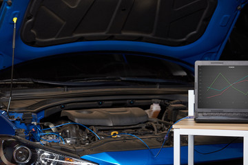 Computer on table for diagnostic car