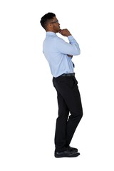 Businessman standing against white background