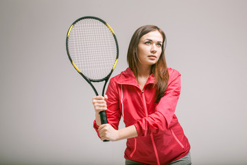 Beautiful young woman playing tennis