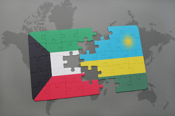 puzzle with the national flag of kuwait and rwanda on a world map