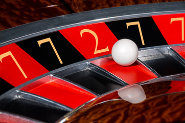 Concept of casino roulette lucky numbers wheel black and red sectors