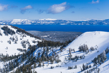 Snow covered slopes of the Sierra Nevada mountains above Lake Tahoe California near a ski resort in winter