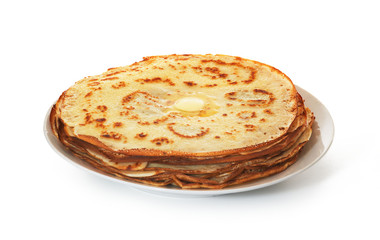 Pile of crepes on plate on white background