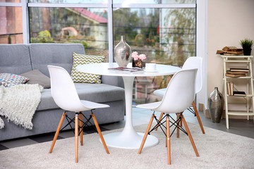 White round table in modern interior of living room