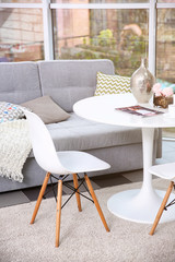 White round table in modern interior of living room