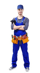 Young plumber holding plunger on white background