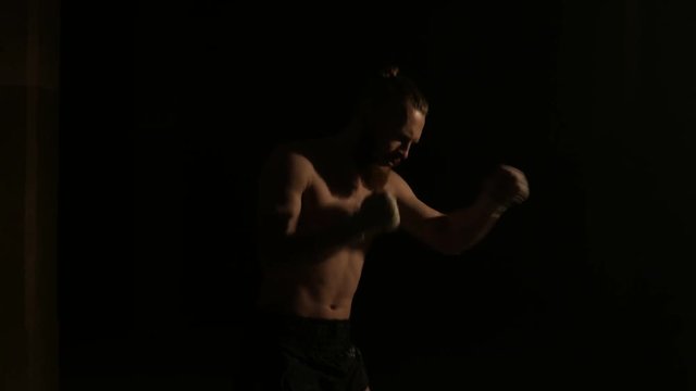 Professional fighter shadowboxing.