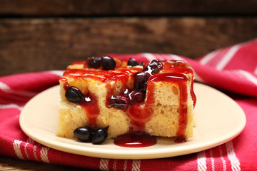 Delicious bread pudding with currant and jam on plate
