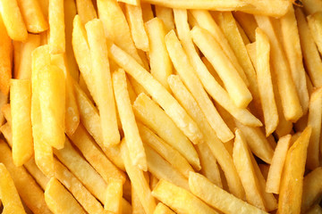 Delicious fries as background