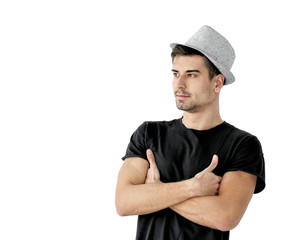 Handsome stylish young man posing on light background