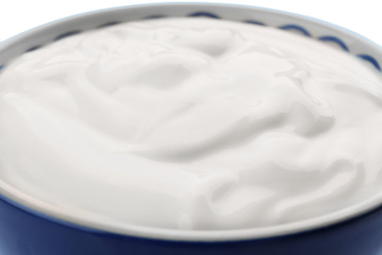 Bowl of delicious yogurt, closeup