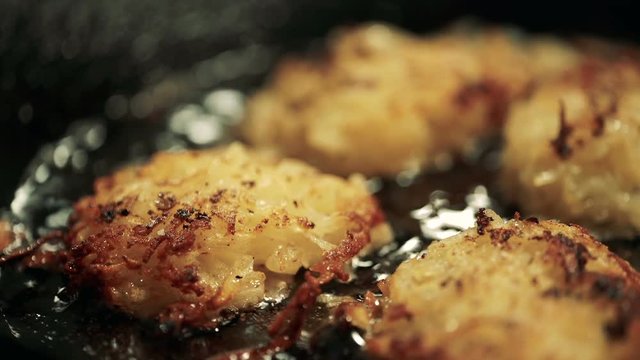 Potato Pancake Part 1a. Crispy Shredded Potato Pancake Fried in A Pan. Close-Up