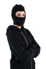 Portrait of female hacker standing with arms crossed