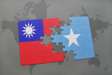 puzzle with the national flag of taiwan and somalia on a world map