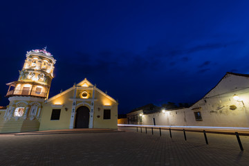 Long exposure view of the Santa Barbara Church during the blue hour in Mompox, Colombia.