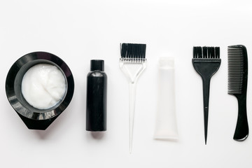 barbershop concept with hairdye tools on white background top view