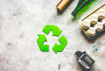 environment concept with recycling symbol on stone background top view mock-up