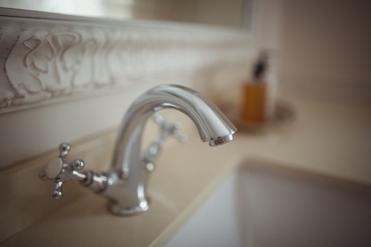 Close-up of basin and tap