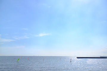 wide view of beautiful sky and yacht sailing a lot on the sea and