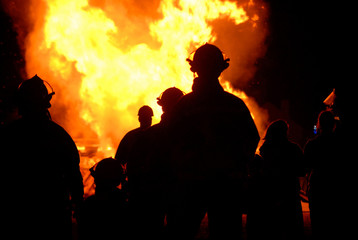 Fototapeta premium Firemen Silhouette and Fire