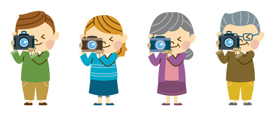 デジカメで写真を撮る家族