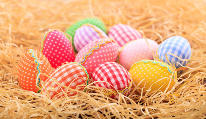 Fototapeta na wymiar Easter eggs on straw background