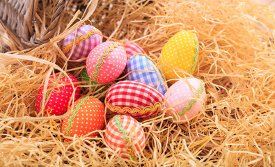 Fototapeta na wymiar Easter eggs on straw background