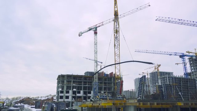 Crane on the construction site transfers the reinforcement