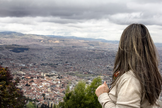 Visitor Looking Out on Bogota, Colombia
