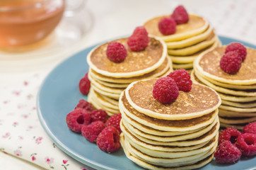 Pancakes with raspberries. Selective focus