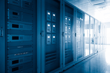 control room of a factory in blue tone.