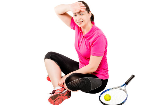 tennis player resting after a workout, and wipes the sweat from his forehead on a white background