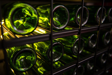stack of wine bottles in winery