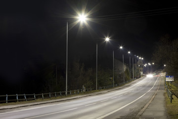 night empty road with modern streetligts
