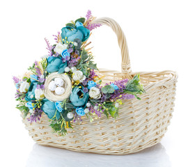 decorated empty wicker basket on a white background