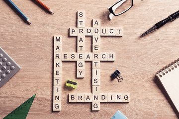 Conceptual business keywords on table with elements of game maki