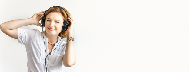 Beautiful girl in headphones, soft focus