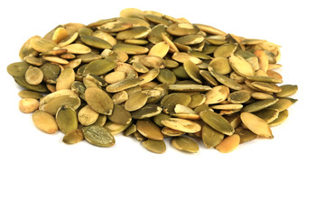 Peeled pumpkin seeds isolated on white background