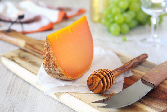 Mimolette cheese and green grapes