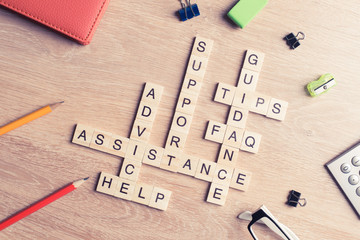 Conceptual media keywords on table with elements of game making 