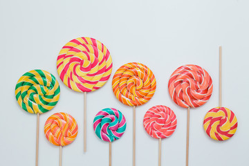 Think differ concept. Lollipop sweet caramel candy copy space