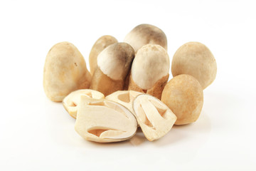 Sliced straw mushroom isolated on white background