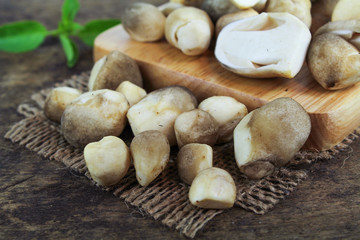 Sliced straw mushroom isolated on white background