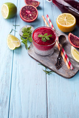 Chia pudding with red berry puree
