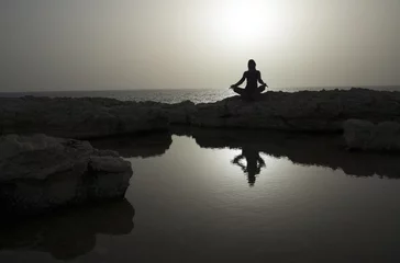 Fotobehang Evening meditation on seaside © ggaallaa